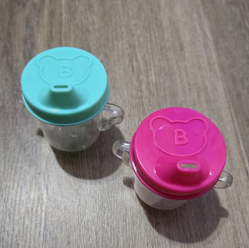 Pink & Blue Double Handled Baby Doll 2 Sippy Cups With B On Top Inside Bear Head